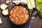 Beef stew soup on a wooden background