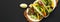 Beef tacos. Corn tortillas on a black background, overhead view. Top view, from above. Copy space