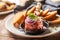 Beef tartare with red onion toast bread and garlic