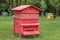 Beehive with bees in a honey farm.