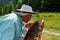 Beekeeper extracting the honey