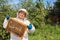 Beekeeper with honeycomb