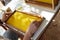 Beekeeper make honeycomb for his apiary