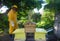 a beekeeper securing his newly-built double bee hive after transferring frames from a brood box