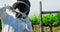 Beekeeper wearing bee suit while preparing for harvest