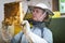 Beekeeper working in an apiary