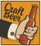 Beer banner with a man`s hand with a bottle