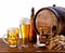 Beer barrel with beer glasses on a wooden table.