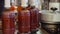 Beer in brown plastic bottles on the conveyor.