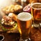 Beer and burgers on wooden table