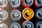 Beer cans. Aluminum cans. Top view of many multicolored open empty cans. Recycling and reuse. Selective focus