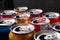 Beer cans. Close-up of multicolored aluminum cans. Many open empty cans. Recycling and reuse. Selective focus