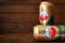 Beer cans with water drops. AMSTEL beer in cans covered with condensation. World famous Dutch brand. Wooden background with copy