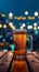 Beer delight glass on wooden table, vibrant city lights backdrop