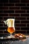 Beer with Fish. glass of beer, splash, Freeze motion splash drops of beer foam. Snack for beer dried smelts