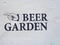 Beer Garden sign on white textured wall