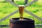 Beer glass on wooden old barrel outdoor