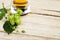 Beer hops and beer glass on wooden table