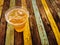 Beer with ice on wooden table