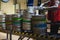 Beer kegs. many metal beer keg stand in rows in a warehouse