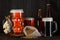 Beer mugs and bottles assortment with smoked salty fish