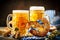 Beer mugs and pretzels on a wooden table. Oktoberfest. Beer festival.