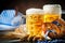 Beer mugs and pretzels on a wooden table. Oktoberfest. Beer festival.