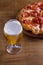 Beer and pizza. Glass of beer. Ale and appetizer snack