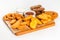 Beer plate with appetizer of croutons, chicken, sauces