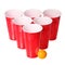 Beer pong. Red plastic cups and orange ping-pong ball isolated on white. Closeup