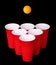 Beer pong. Red plastic cups and orange table tennise ball over black