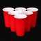 Beer pong. Red plastic cups and ping pong ball over black