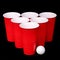 Beer pong. Red plastic cups and ping pong ball over black