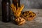 Beer salty snacks, rustic background