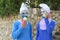 Beer-Sheva Negev, Israel - March 24,Two teenagers in blue gnome costumes in white caps, Purim