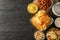 Beer snacks, glass of beer, potato chips, beer nuts, sauces, glass of beer on wooden background, space for text