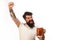 Beer time. Emotional bearded hipster drinking craft beer from mug. Brewing. Handsome man with mug of beer raised hand