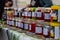 Beervelde/Belgium - October 13 2019: A bunch of freshly made pots of jam. The jars are colorful due to the homegrown fruit. The