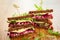 Beet,avocado and arugula sandwich