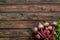 Beet - fresh, with leaves - on wooden table top view copy space