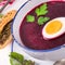 Beet green soup with egg