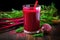 beet juice in a clear glass with a straw and beetroot beside