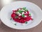 Beet salad with white cheese and parsley