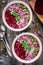 Beet smoothie bowl with chia seeds, coconut, pumpkin seeds, quinoa, sunflower seeds and mint