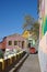 A beetle car in a colored street of Valparaiso