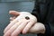 Beetle on the human hand, nature conservation topic