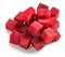 Beetroot diced into cubes on white background