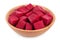 Beetroot diced in wooden bowl isolated on white background with clipping path and full depth of field