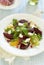 Beetroot and orange salad with goat cheese and pomegranate