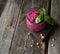 Beetroot puree with prunes and walnuts glass jar. Rustic style.